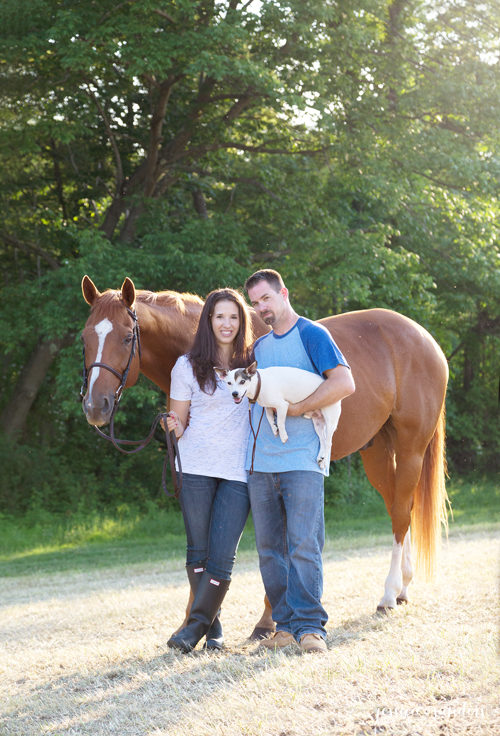 woman and man with jack russell terrier and chestnut thoroughbred horse at Christie Hoffman Farm Park
