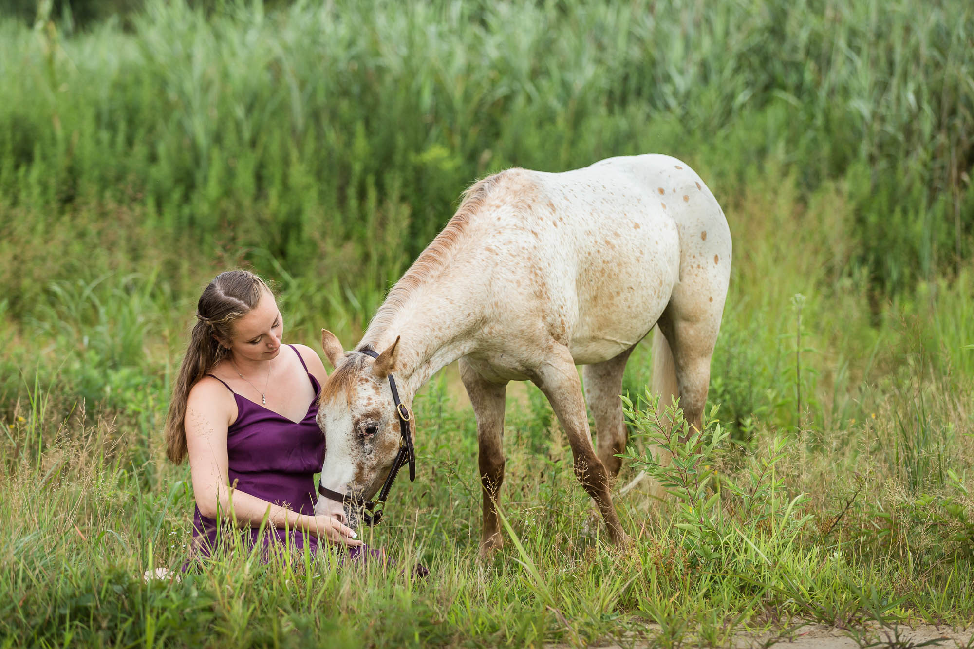 Allyson and Poncho in the grass at Legacy Riding Stables