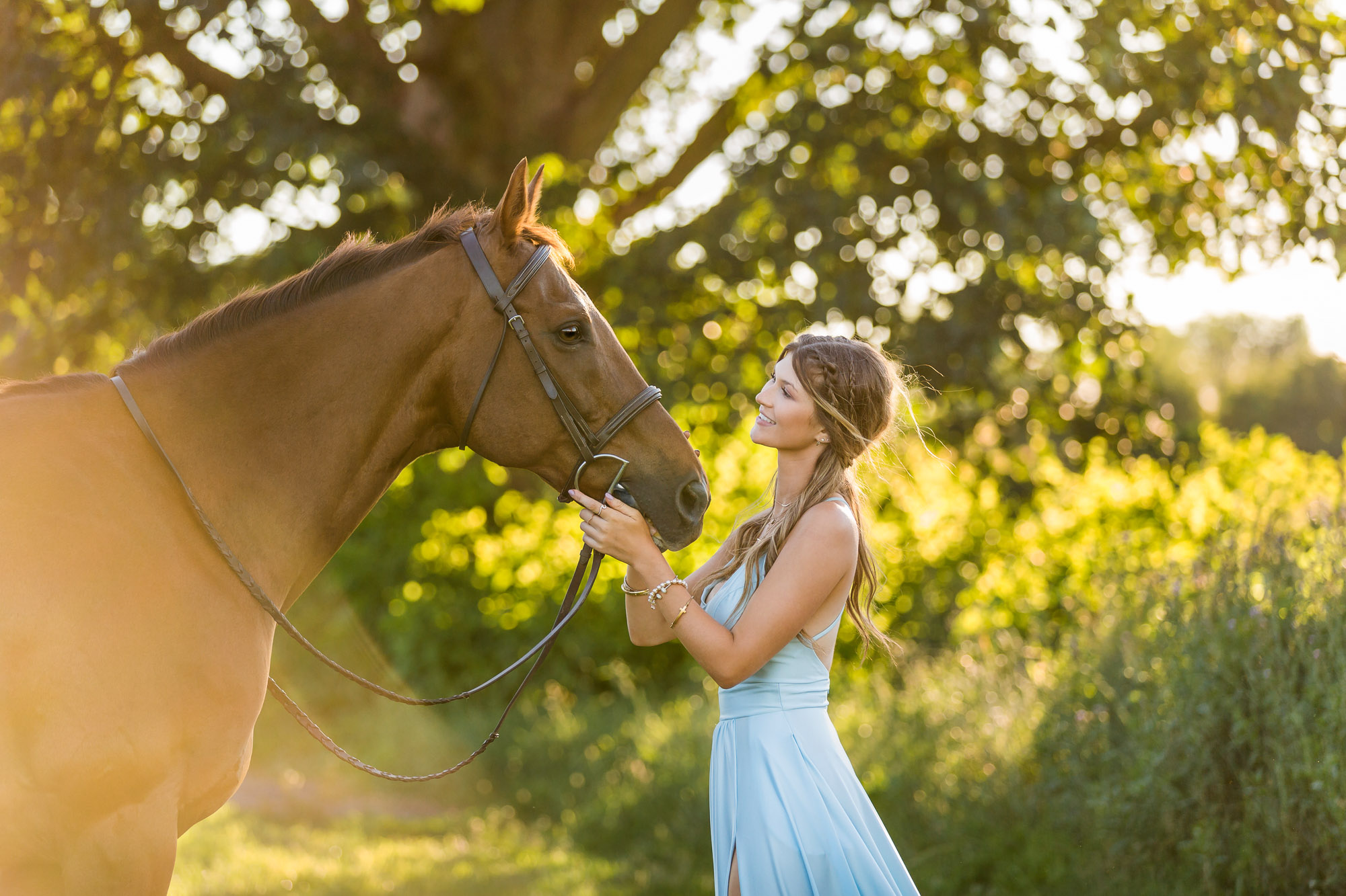 Alyssa in a blue dress with Ben