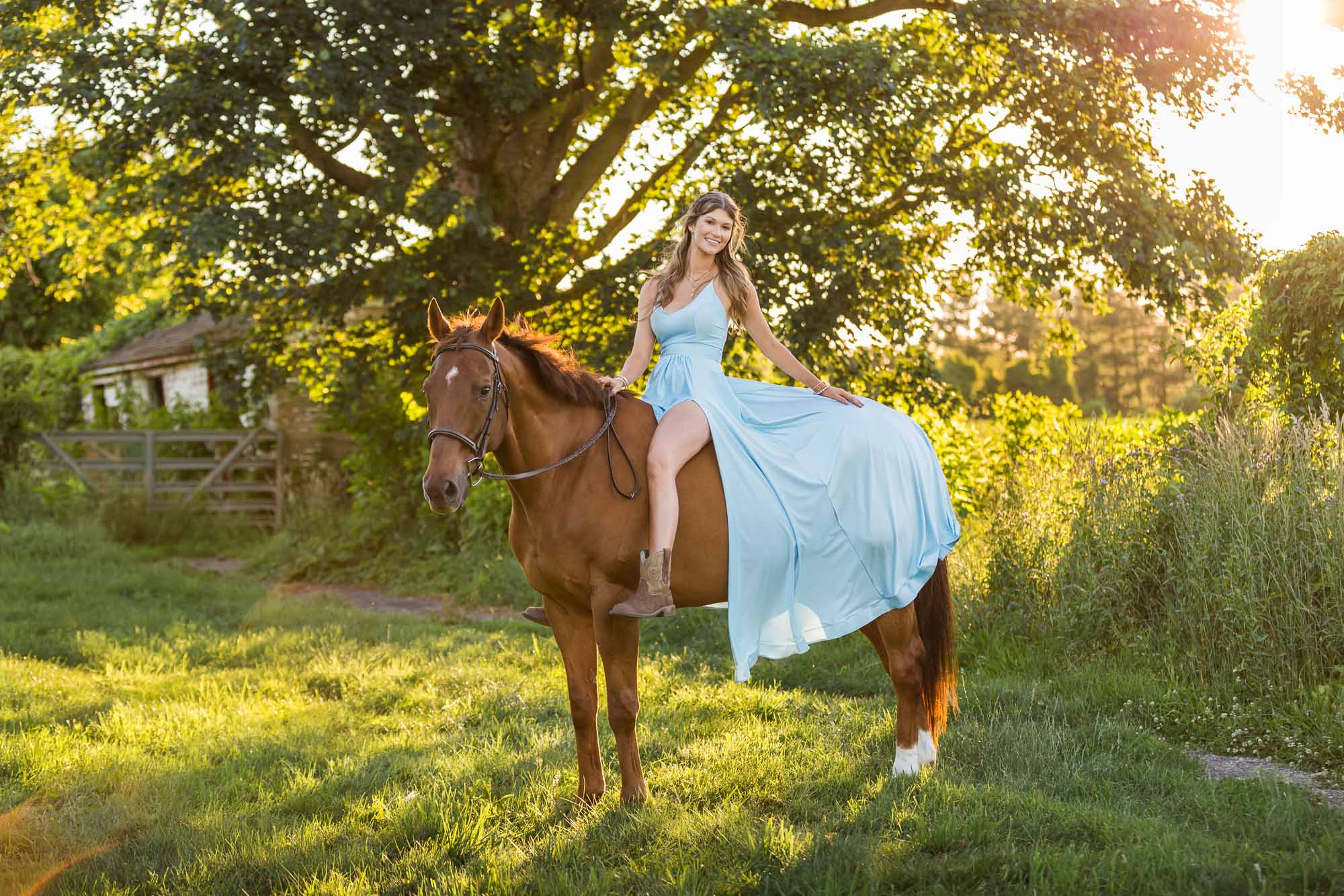 Alyssa in a blue dress sitting on Ben